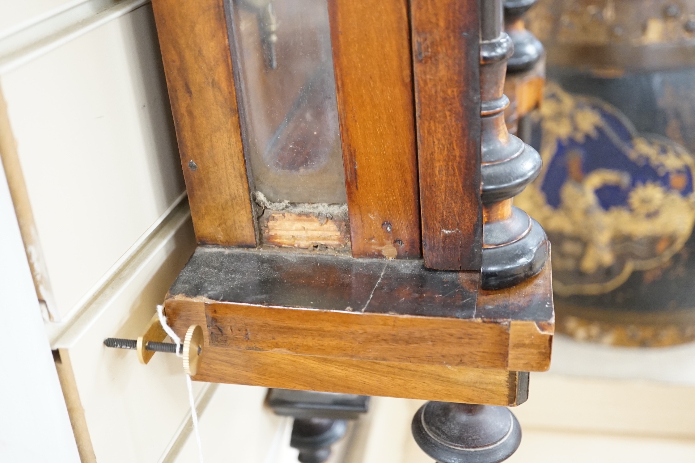 A walnut and ebony cased Vienna wall clock, 130cms high